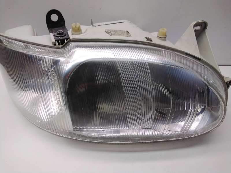Recambio de faro derecho para ford escort berl./turnier atlanta berlina referencia OEM IAM 1076554  