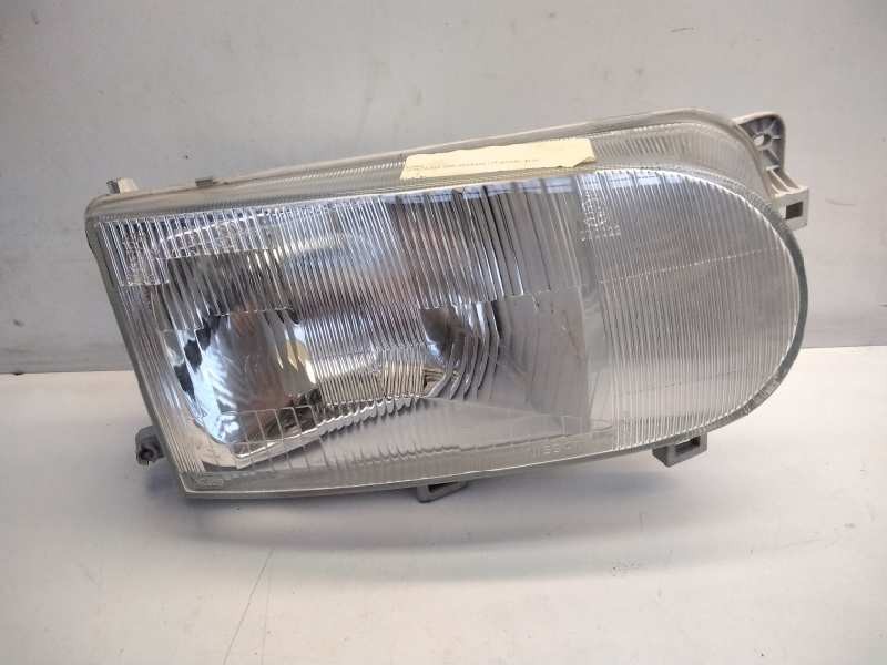 Recambio de faro derecho para nissan vanette cargo referencia OEM IAM 260107C007  67735040