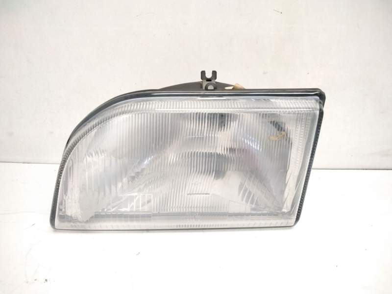 Recambio de faro izquierdo para ford fiesta berl./courier si referencia OEM IAM 7071010  