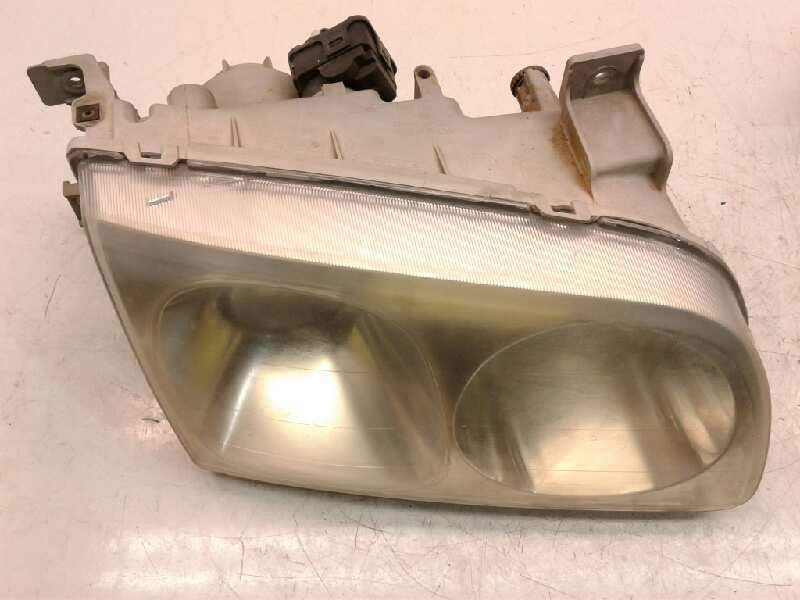 Recambio de faro derecho para hyundai trajet (fo) 2.0 crdi gls referencia OEM IAM 921033A020  