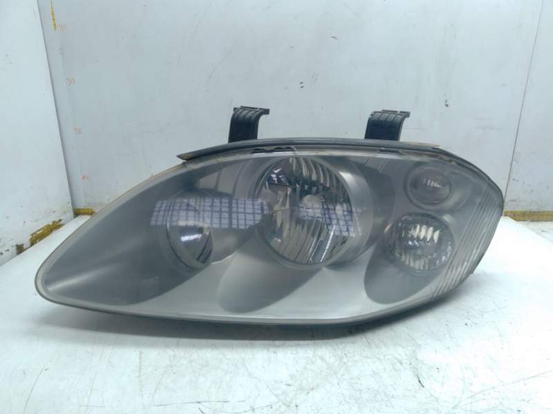 Recambio de faro izquierdo para ssangyong rodius i 2.7 xdi 4wd referencia OEM IAM 8310121201  