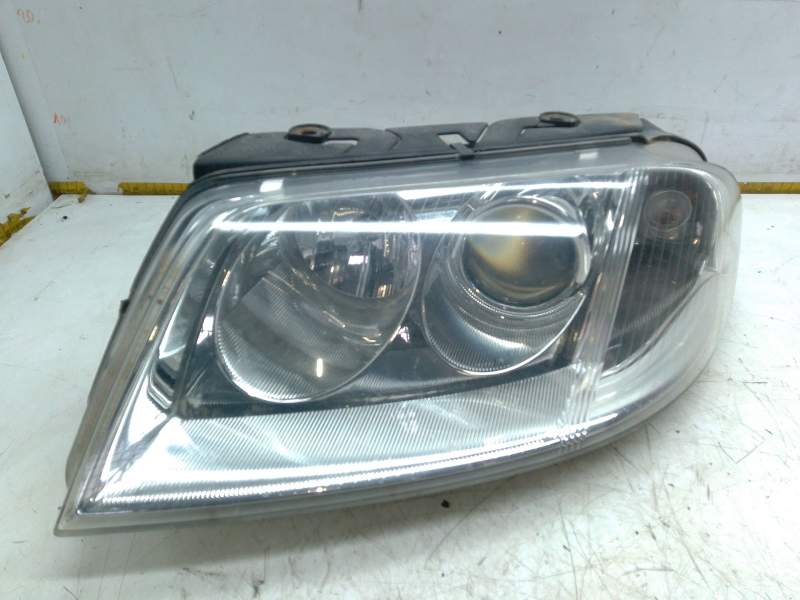 Recambio de faro izquierdo para volkswagen passat b5 (3b2) 1.9 tdi referencia OEM IAM 1EL00835001  
