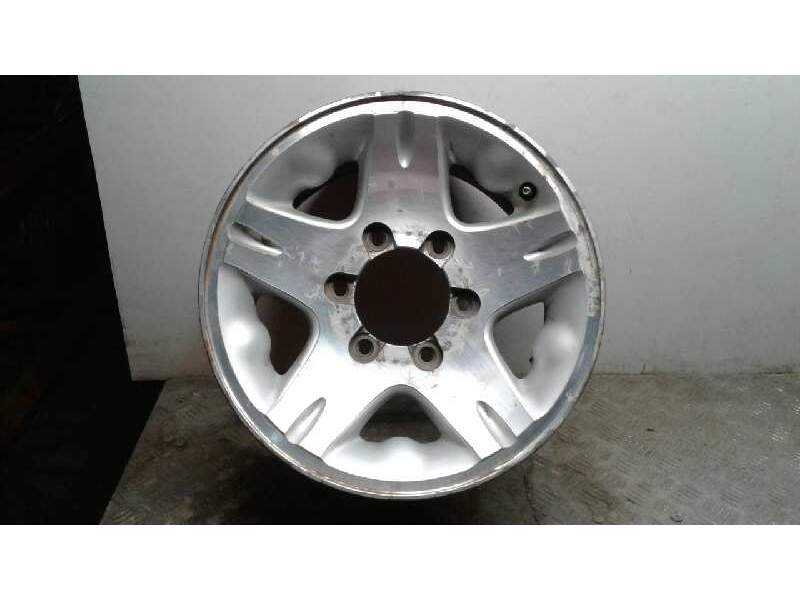 Recambio de llanta aluminio para ssangyong musso 2.9 d referencia OEM IAM 15 6 TORNILLOS  