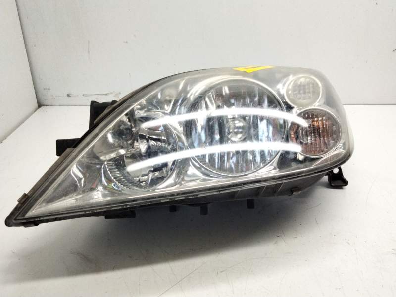 Recambio de faro izquierdo para nissan primera (p12) 1.6 referencia OEM IAM 26060AU80B  