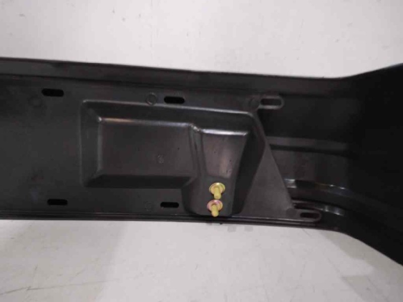 Recambio de paragolpes trasero para ford escort berlina referencia OEM IAM   