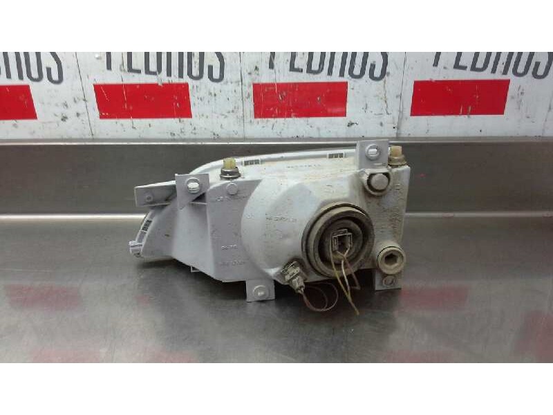 Recambio de faro derecho para ford orion referencia OEM IAM 02584811  