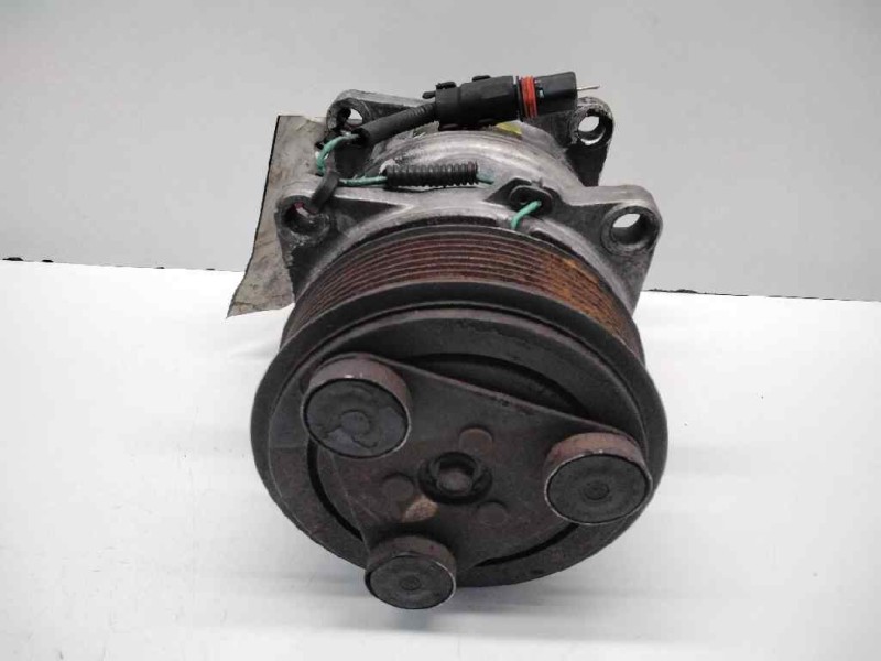 Recambio de compresor aire acondicionado para man fe 410 a referencia OEM IAM 186D202155  