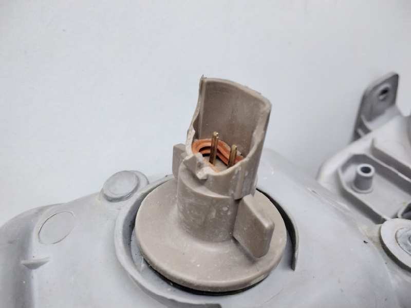 Recambio de faro izquierdo para daewoo nubira berlina cdx referencia OEM IAM 0301000919  