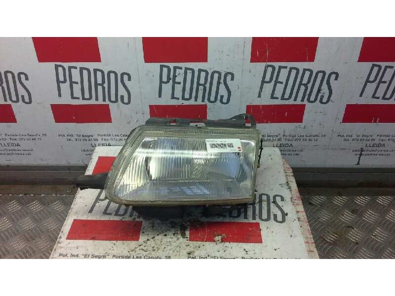 Recambio de faro izquierdo para citroen saxo 1.4 sx referencia OEM IAM   
