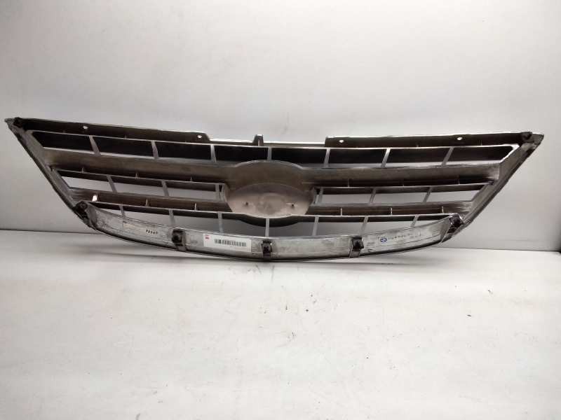 Recambio de rejilla delantera para kia carens referencia OEM IAM OK2EF50710  