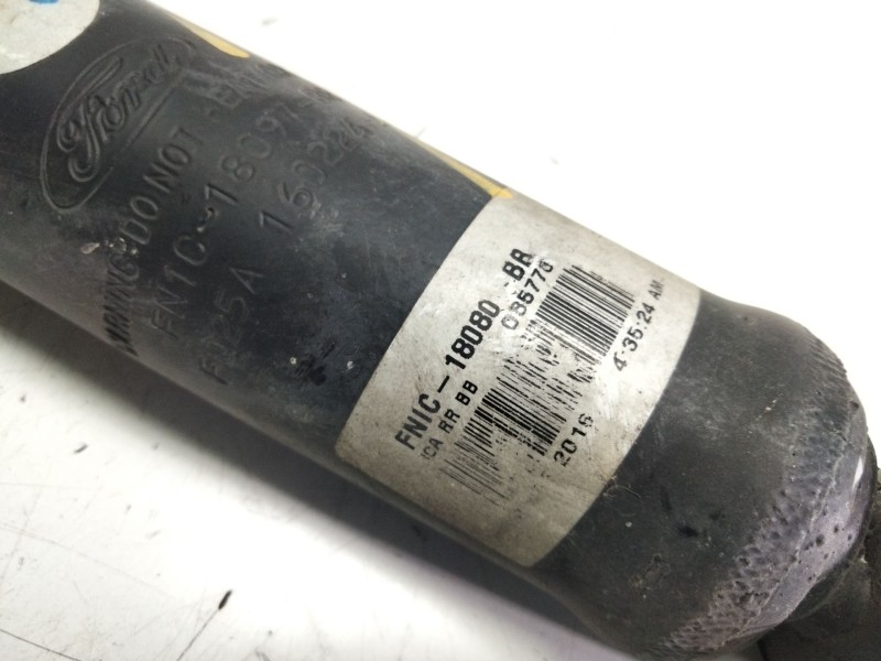 Recambio de amortiguador trasero izquierdo para ford ecosport titanium referencia OEM IAM FNIC18080BB  